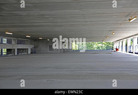 Upper floor of a multi-storey car park under construction in Birmingham, UK. Shows large span of concrete ceiling slab Stock Photo
