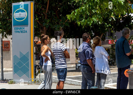 Crete, Greece. 28th June, 2015. People withdraw money  from ATMs, Rethymno, Crete, Greece Stock Photo