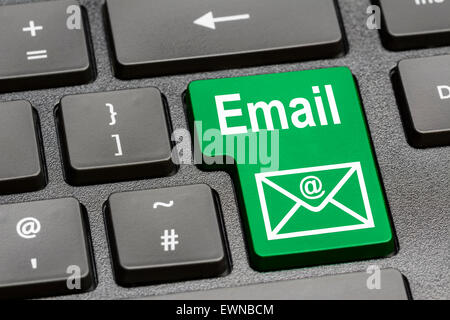 Computer keyboard with a dedicated email key. Stock Photo