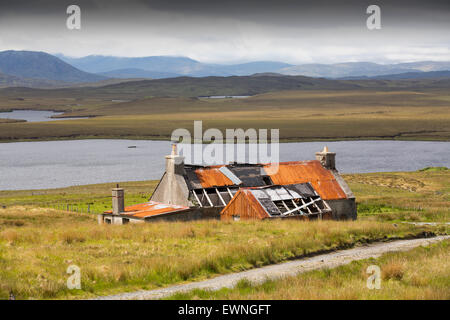 An old old abandoned croft house at Achmore on the Isle of Lewis, Outer Hebrides, Scotland, UK. Stock Photo