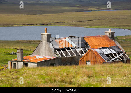 An old old abandoned croft house at Achmore on the Isle of Lewis, Outer Hebrides, Scotland, UK. Stock Photo