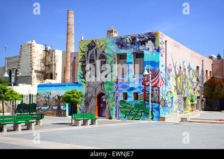 Brightly coloured mural in 'The Christian Zone' in Rethymnon. Situated adjacent to the Nerantze Mosque which is not seen. Stock Photo