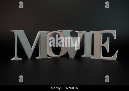 3d renderin of MOVIE text sign on the dark grey background Stock Photo