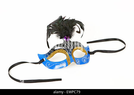 Blue Venetian Mask with Black Feather and black ribbons isolated on white background. Horizontal presentation with nobody in photo. Stock Photo
