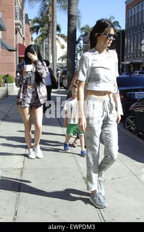 Kendall Jenner and Kylie Jenner go for a quick yogurt run in Beverly Hills  Featuring: Kendall Jenner, Kylie Jenner Where: Los Angeles, California, United States When: 28 Apr 2015 C Stock Photo