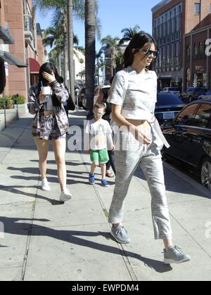 Kendall Jenner and Kylie Jenner go for a quick yogurt run in Beverly Hills  Featuring: Kendall Jenner, Kylie Jenner Where: Los Angeles, California, United States When: 28 Apr 2015 C Stock Photo