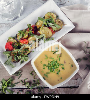 Potato And Cheddar Soup With Roasted Vegetables Stock Photo