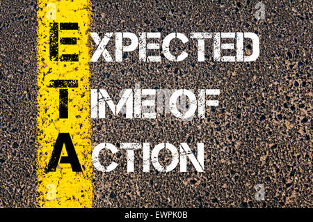 Concept image of Business Acronym ETA as Expected Time Of Action written over road marking yellow paint line. Stock Photo