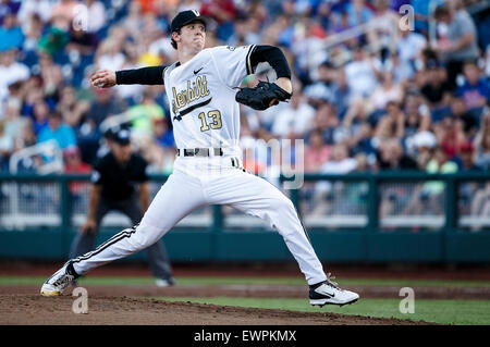 Vanderbilt Commodores starting pitcher Walker Buehler (13) delivers a pitch  to the plate against the TCU Horned Frogs in Game 12 of the NCAA College  World Series on June 19, 2015 at