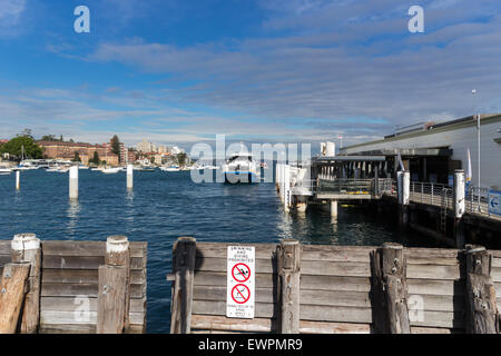 Manly, Australia-June 5th 2015: The high speed ferry approaches Manly Wharf. Stock Photo