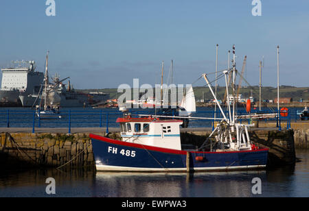 Small fishing boat at quayside, Custom House Quay, Falmouth, Cornwall, England, UK Stock Photo