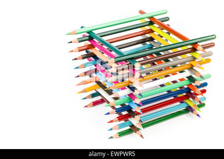 Built square construction of various colored crayons isolated on white background Stock Photo