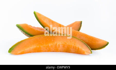 Three slices of melon, juicy and ripe, isolated on white background. Stock Photo