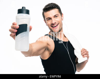 Smiling fitness man holding towel and bottle with water isolated on a white background Stock Photo