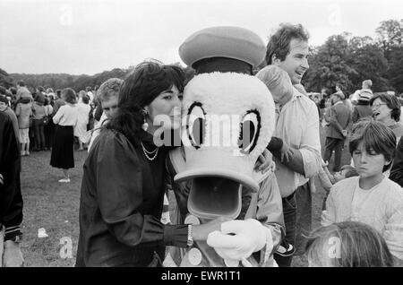 The Mirror organised a Disney day out for the kids at Lord and Lady Bath's Longleat House, in Wiltshire. A great fun day in which Ghislaine Maxwell presented a cheque for £2000 for the save the children fund.  13th September 1985.