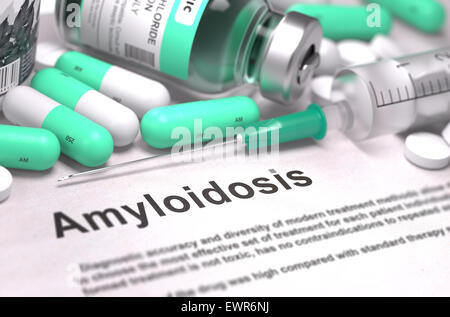 Amyloidosis - Printed Diagnosis with Mint Green Pills, Injections and Syringe. Medical Concept with Selective Focus. Stock Photo