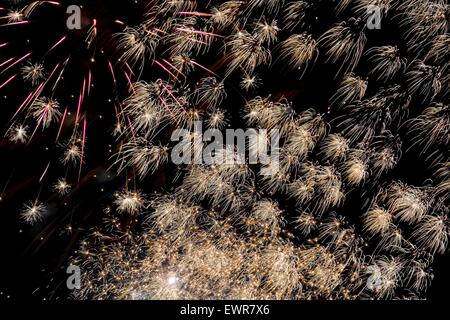 Light drawn picture made due to long time exposure of fireworks explosion against black sky Stock Photo