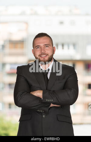 Portrait Of Young Construction Manager With Arms Crossed Stock Photo