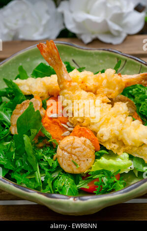 fresh deep fried Japanese tempura shrimps with salad and sea urchin Stock Photo
