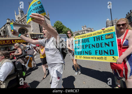 London, UK. 30th June, 2015. Protest against axing of the Independent Living Fund (ILF) by Disabled People Against Cuts (DPAC) in Westminster Credit:  Guy Corbishley/Alamy Live News Stock Photo