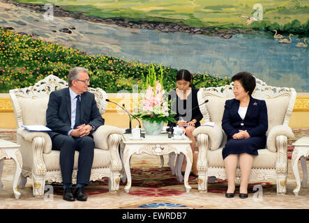 Beijing, China. 30th June, 2015. Sun Chunlan (R), head of the United Front Work Department of the Communist Party of China (CPC) Central Committee, meets with a delegation led by Pierre Laurent, national secretary of the French Communist Party (PCF) in Beijing, capital of China, June 30, 2015. © Xie Huanchi/Xinhua/Alamy Live News Stock Photo