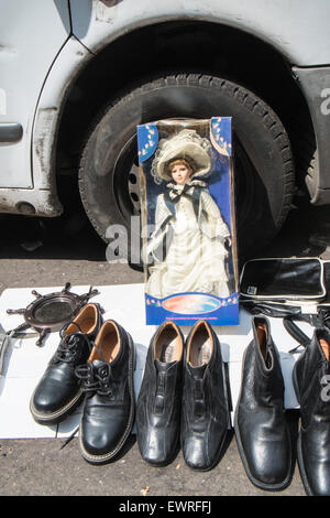 Secondhand used recycling vintage goods at flea market,St.-Ouen de, Clignancourt, Paris,France.Old French goods,produce,antiques Stock Photo