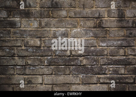 Rustic Old Brick Wall Texture Pattern as Urban BAckground, Retro Toned Vintage Effect Stock Photo