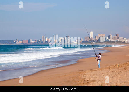 DURBAN, SOUTH AFRICA - JUNE 12, 2015: Lone unknown fisherman on Blue ...