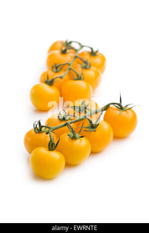yellow tomatoes on white background Stock Photo