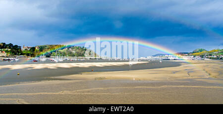 Beautiful rainbow over the River Conwy estuary in North Wales. Stock Photo