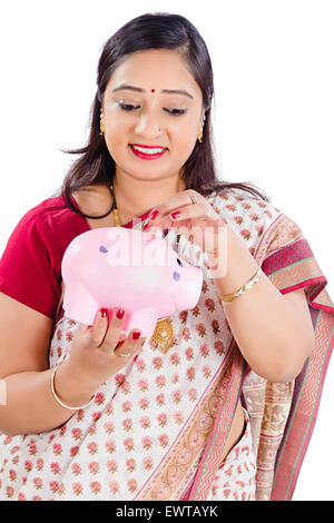 1 indian Woman Saving Money Piggy Bank Stock Photo