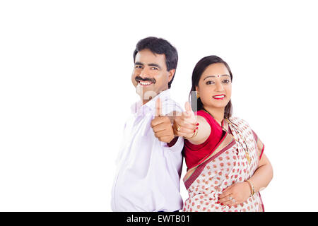 2 indian Married Couple Back To Back thumbs up showing Stock Photo