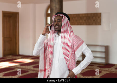 Arab Saudi Emirates Man Using A Smart Phone Stock Photo