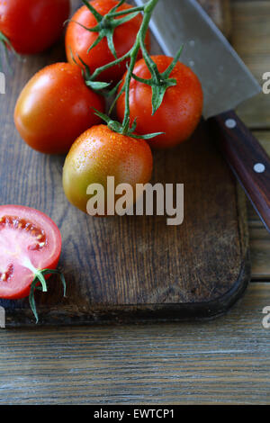 branch of red tomatoes, healthy food Stock Photo