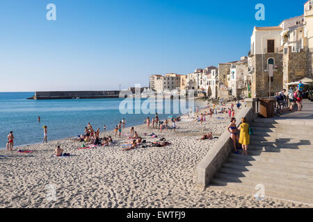 The beach and the Old Town in Cefalù, Sicily. Historic Cefalu is a majour travel destination. Stock Photo