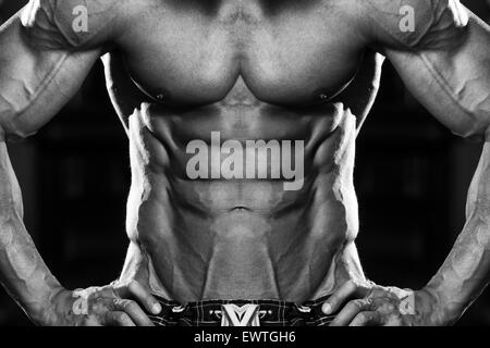 perfect male body physique with abdominal chest and arms muscles