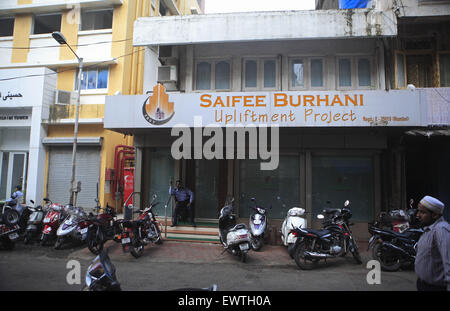 Mumbai, Maharashtra, India. 4th Sep, 2013. 4 Sept. 2013 : Bhendi Bazaar, Mumbai, INDIA:.The office of the Saifee Burhani Upliftment Project at Bhendi Bazaar.STORY :.In Bhendi Bazaar, a market district, in the heart of Mumbai, dilapidated old buildings line the streets. Many have cramped, dark, dingy interiors with crumbling staircases. Some are precariously supported by bamboo poles. Giant rats scurry across the floors. Such decayed surroundings ought to be deserted, but Bhendi Bazaar district, where the majority of the community is made up of Dawoodi Bohra Muslims, is bustling. The nar Stock Photo