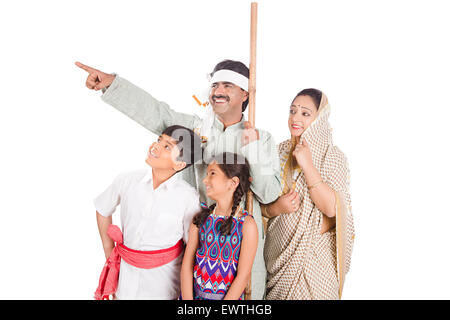 indian Rural Parents and kids finger Showing Stock Photo