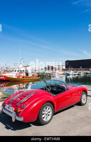 MG Sports car by boat marina, Skagen Harbour, Skagen, North Jutland Region, Denmark Stock Photo