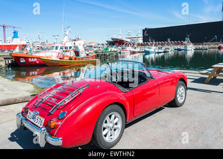 MG Sports car by boat marina, Skagen Harbour, Skagen, North Jutland Region, Denmark Stock Photo