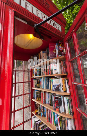 Close-up of Lewisham Micro Library, in an old, red, Telephone box, on Loampit Hill, Lewisham. Stock Photo