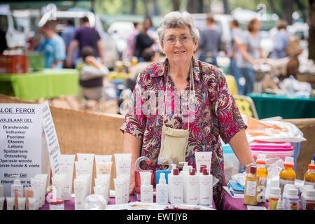 SOUTH AFRICA- Woman, standing at her booth for farmers market in Pretoria Stock Photo