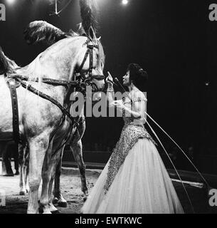 Bertram Mills Circus, a woman who performs with horses. 19th December 1958. Stock Photo