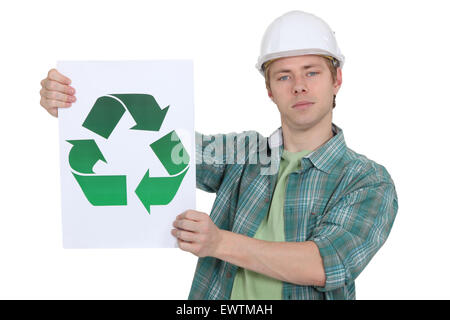 Construction worker promoting recycling. Stock Photo