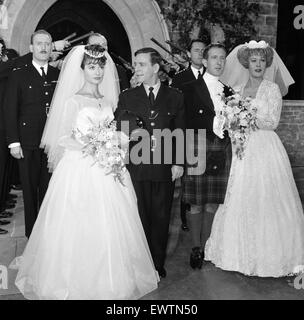 Norman Wisdom 'marries' film star Jennifer Jayne, at Pinewood Studios. It was a double wedding, alongside Ronnie Stevens and his bride Eleanor Summerfield, for their new film 'On the Beat'. 16th August 1962. Stock Photo