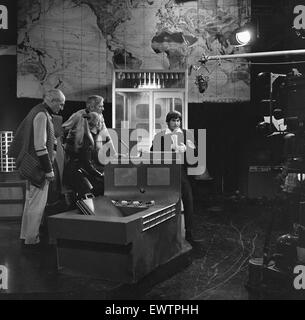 Left to Right: Actors Philip Ray (as Daniel Eldred), Louise Pajo (as Gia Kelly) Ronald Leigh Hunt ( as Julian Radnor) and Patrick Troughton (as Dr Who), rehearsing a scene from the BBC science fiction series Dr Who 'Seeds of Death'. At the BBC Lime Grove Stock Photo