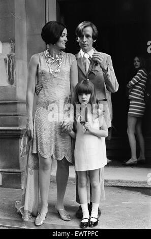 Maxime de la Falaise, weds John McKendry, Curator of Prints at the Metropolitan Museum in New York, pictured at Chelsea Register Office, London, 6th July 1967. The wedding was attended by her daughter Louise de la Falaise aka Loulou (standing in doorway, Stock Photo