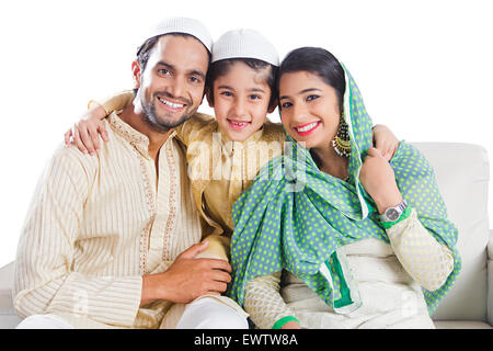 indian Muslim Parents and son sitting home Stock Photo