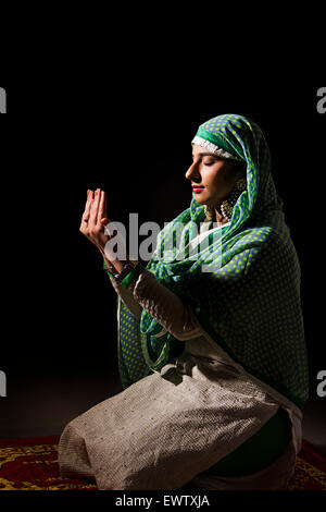 1 indian Muslim woman Namaz Stock Photo