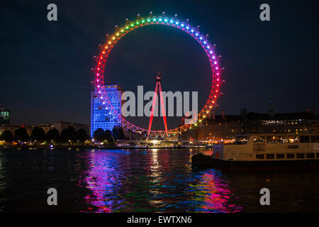 London Eye lit in rainbow for Pride in London 2015 Stock Photo